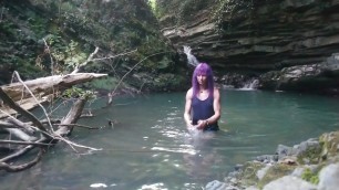 Alexa Cosmic transgirl swimming at waterfall in shirt and t-shirt...