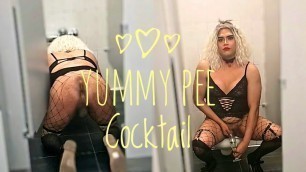 Sissy femboy drinks pee in public stall