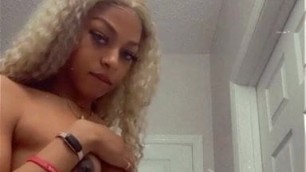 Beautiful black tranny stroking dick