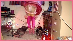 Upskirts in pink thigh-high PVC boots and 9-inch stilettos.