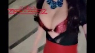 Sexy Sissy Asian flashing fake boobs in public