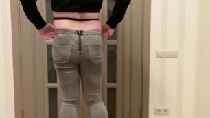 Femboy in grey skinny back zipper jeans, high heels and black cropped blouse dancing masturbating and cum
